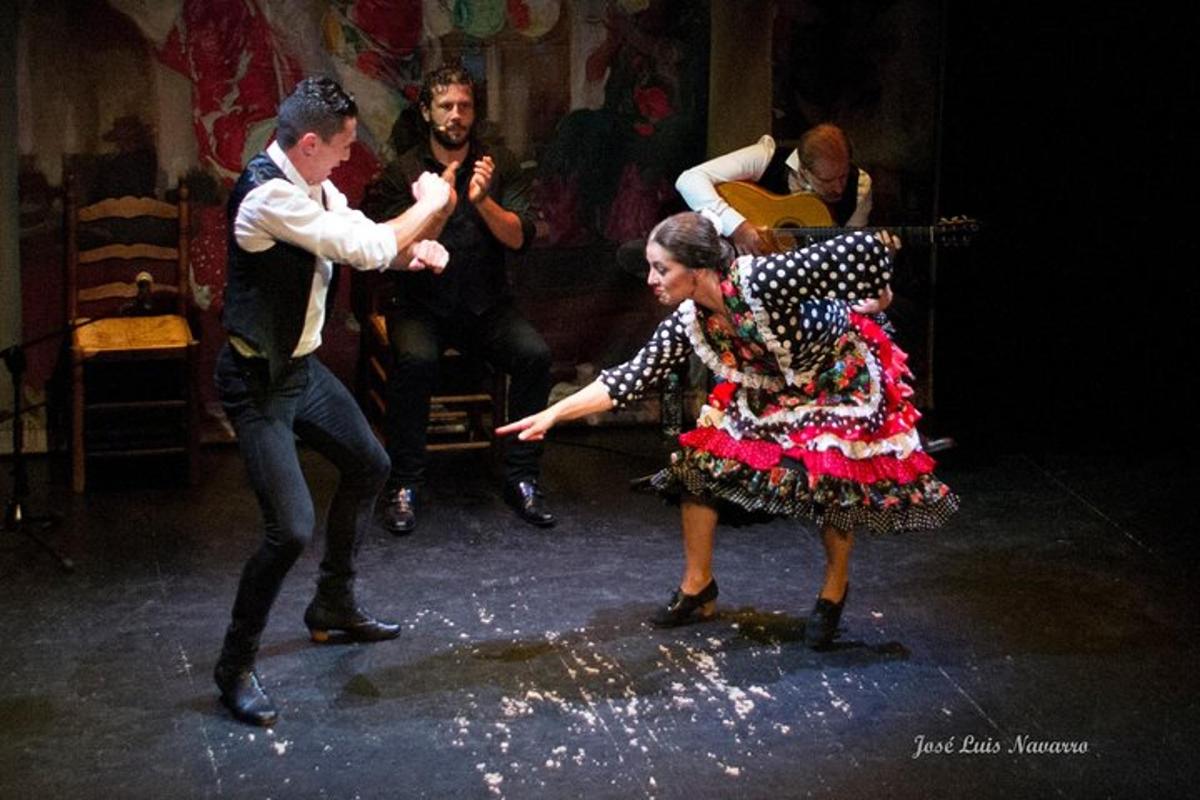 a group of people dancing on a stage