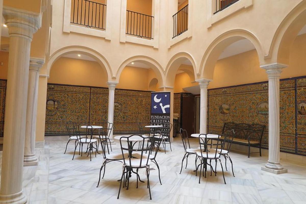 a room with tables and chairs in a building