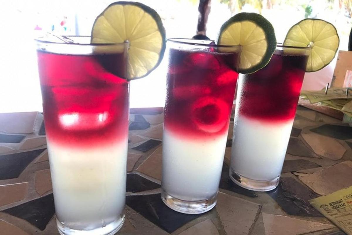 a group of three cocktails sitting on a table