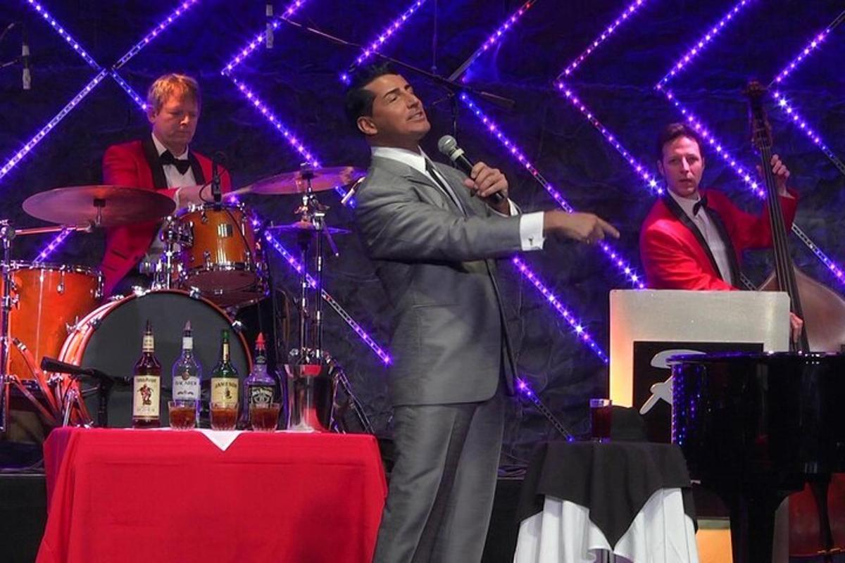 a man standing on a stage with a microphone