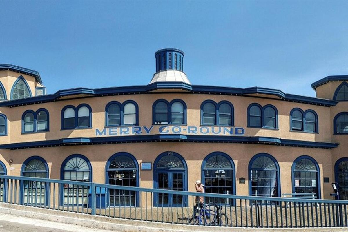 a large brick building with a merry go round sign on it