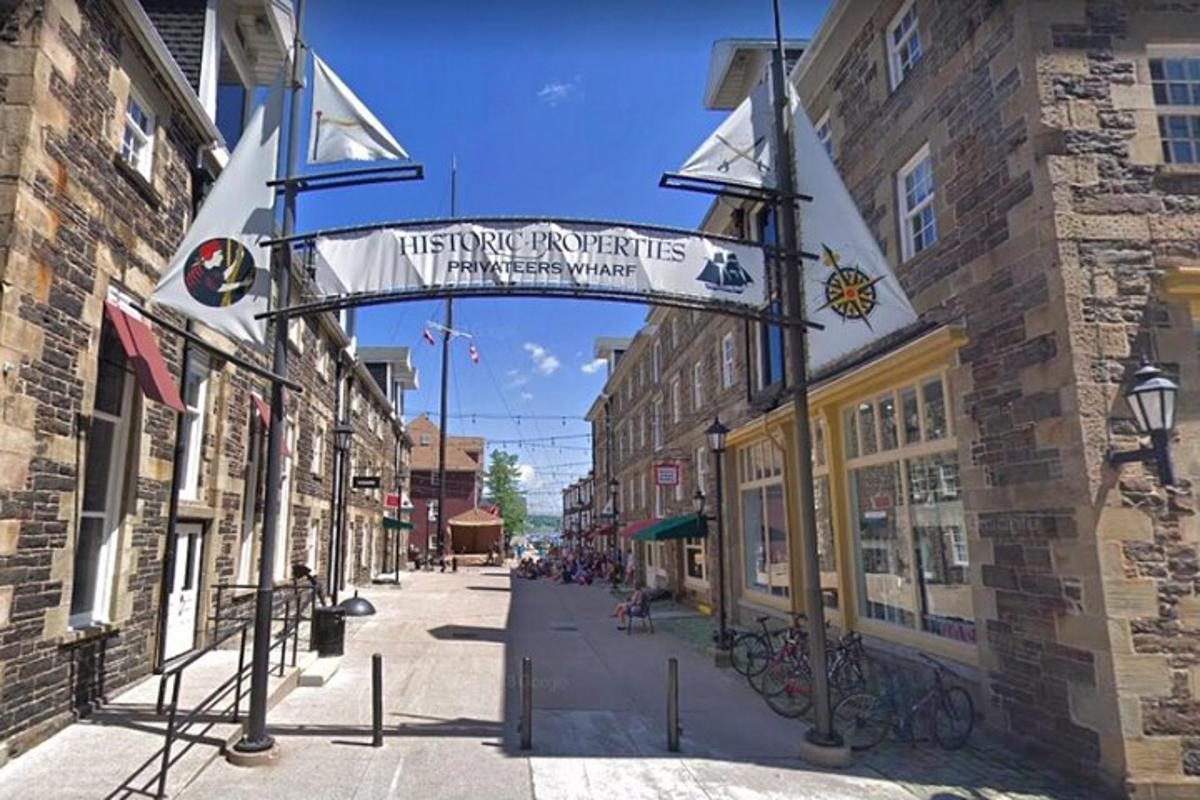a street sign in a town with buildings