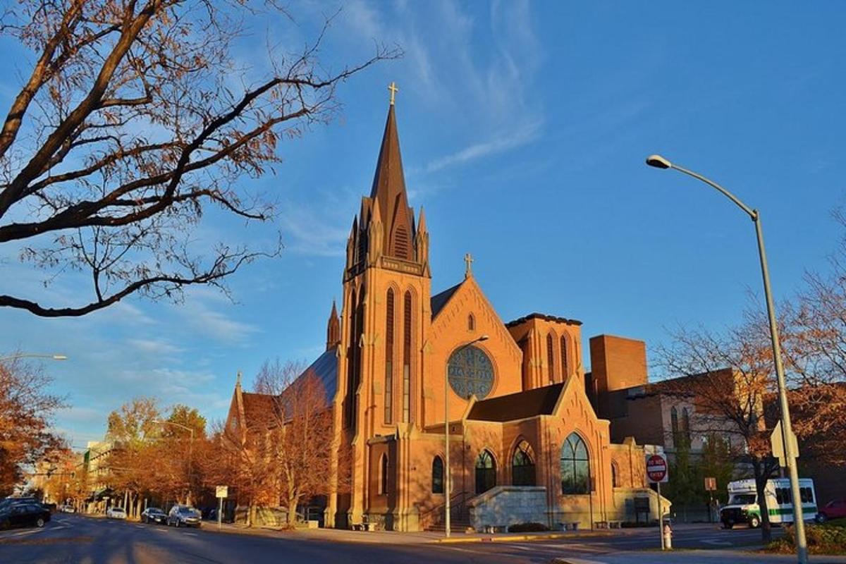 a large church with a steeple on a street