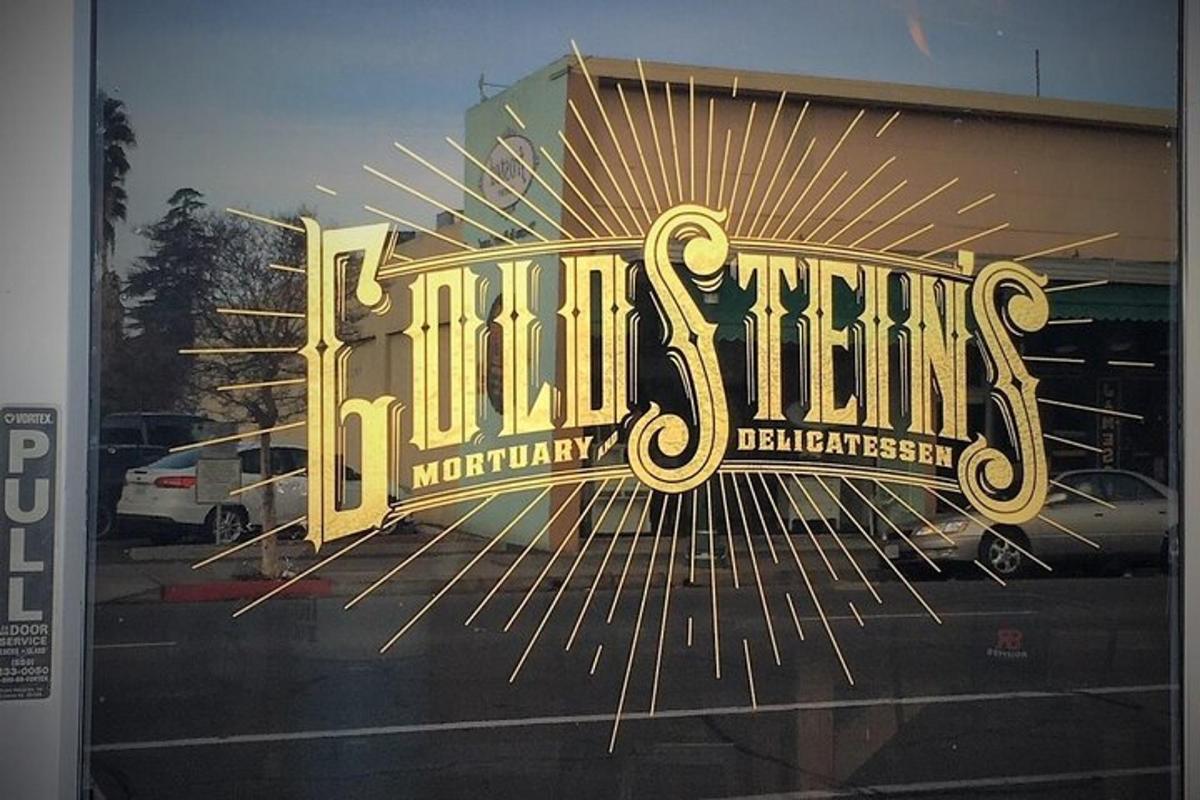a window of a store with a sign on it