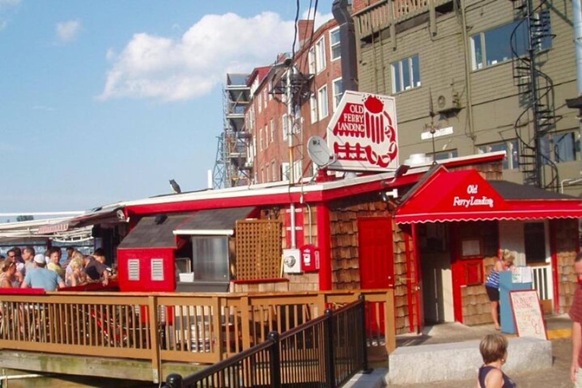 a red building with people standing outside of it