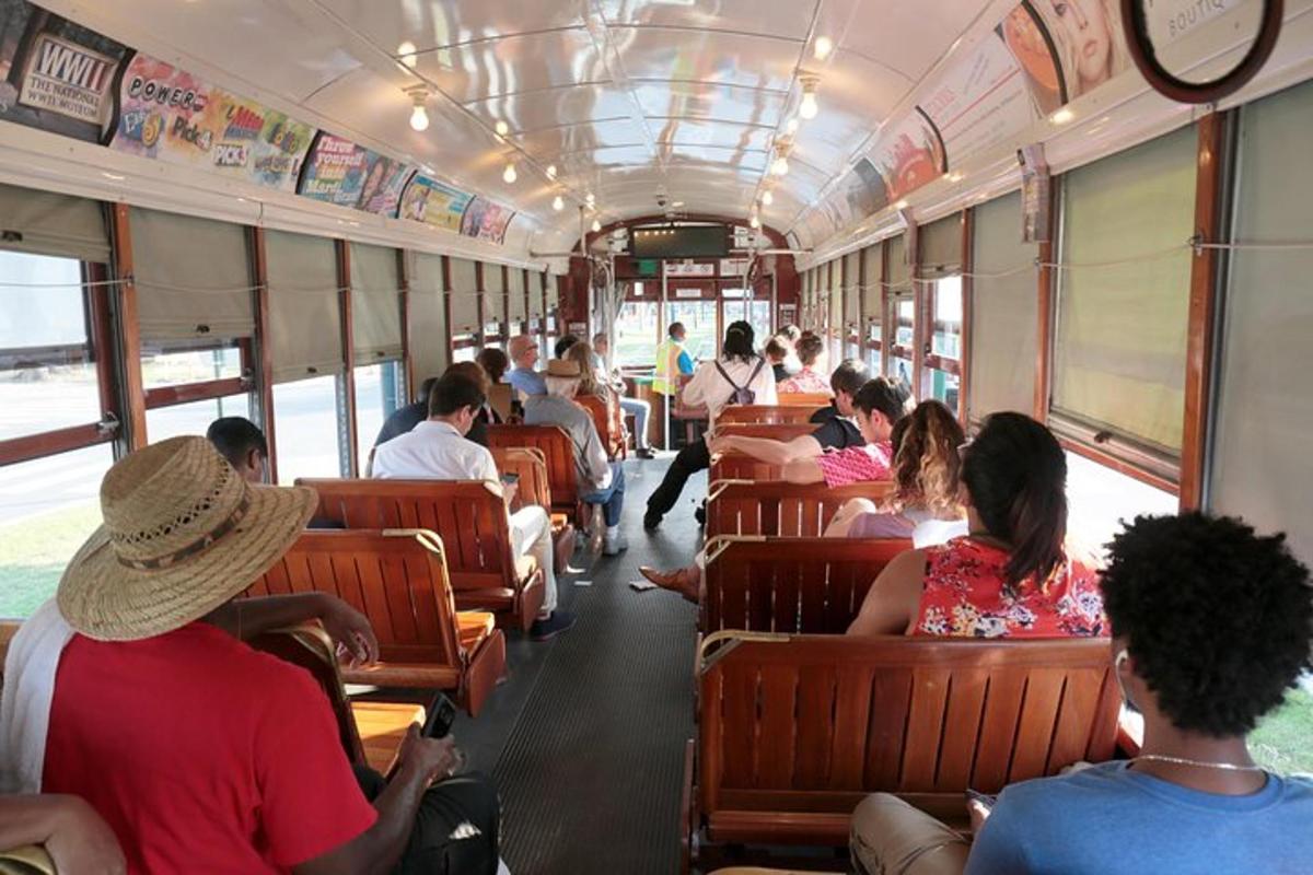 a group of people sitting inside of a bus