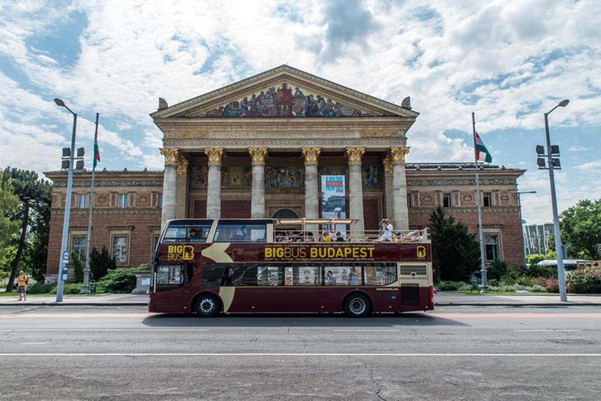 a double decker bus parked in front of a building