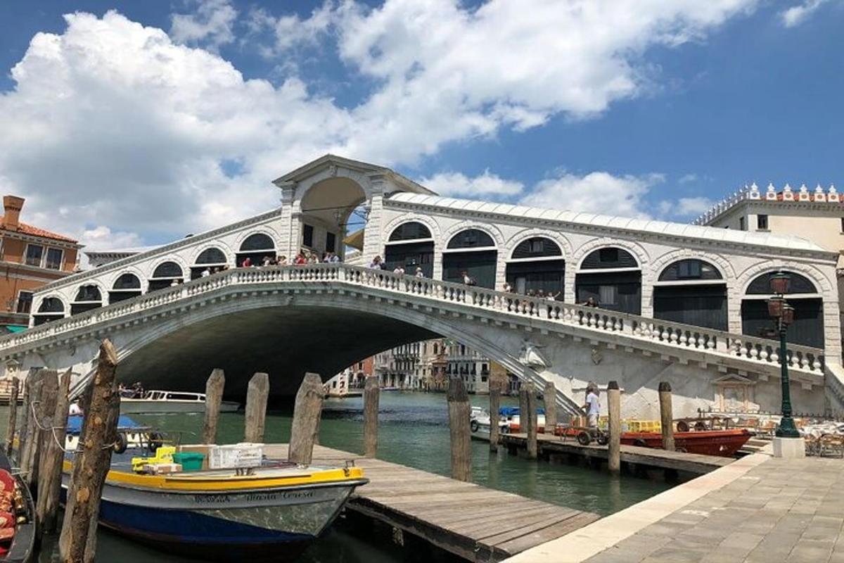 a bridge over a river with a group of people on it