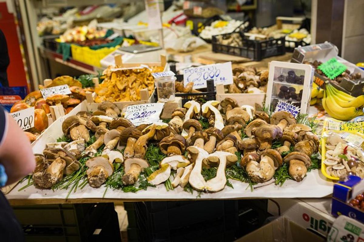 a display of mushrooms on a table in a market