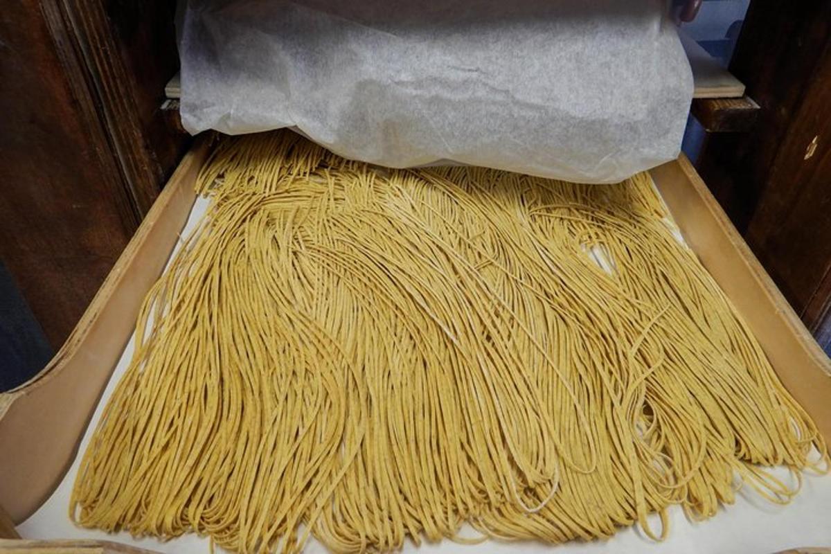 a pile of spaghetti sitting on top of a table