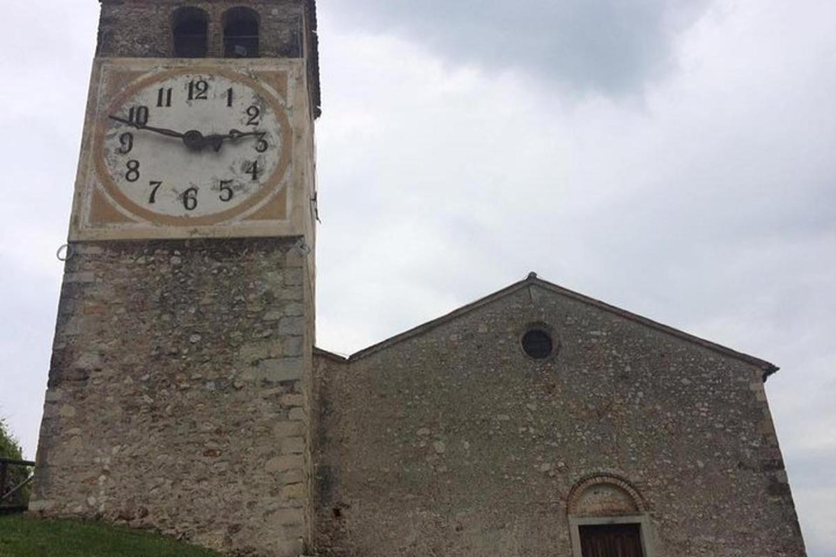 a clock tower on the side of a building