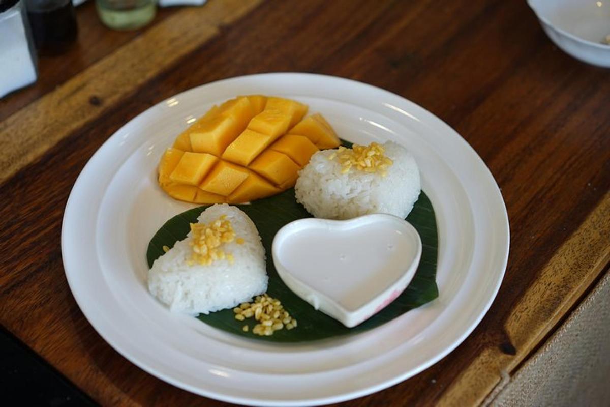 a white plate of sushi with a heart on it
