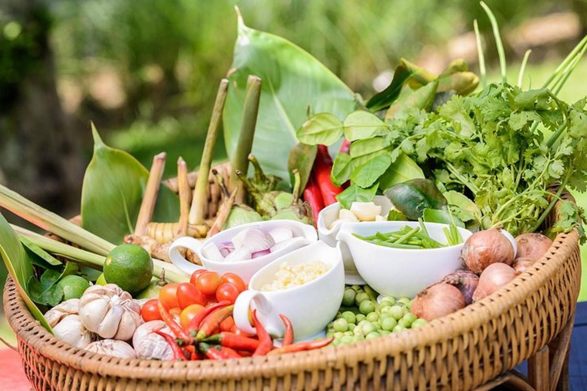 a basket filled with lots of vegetables on a table