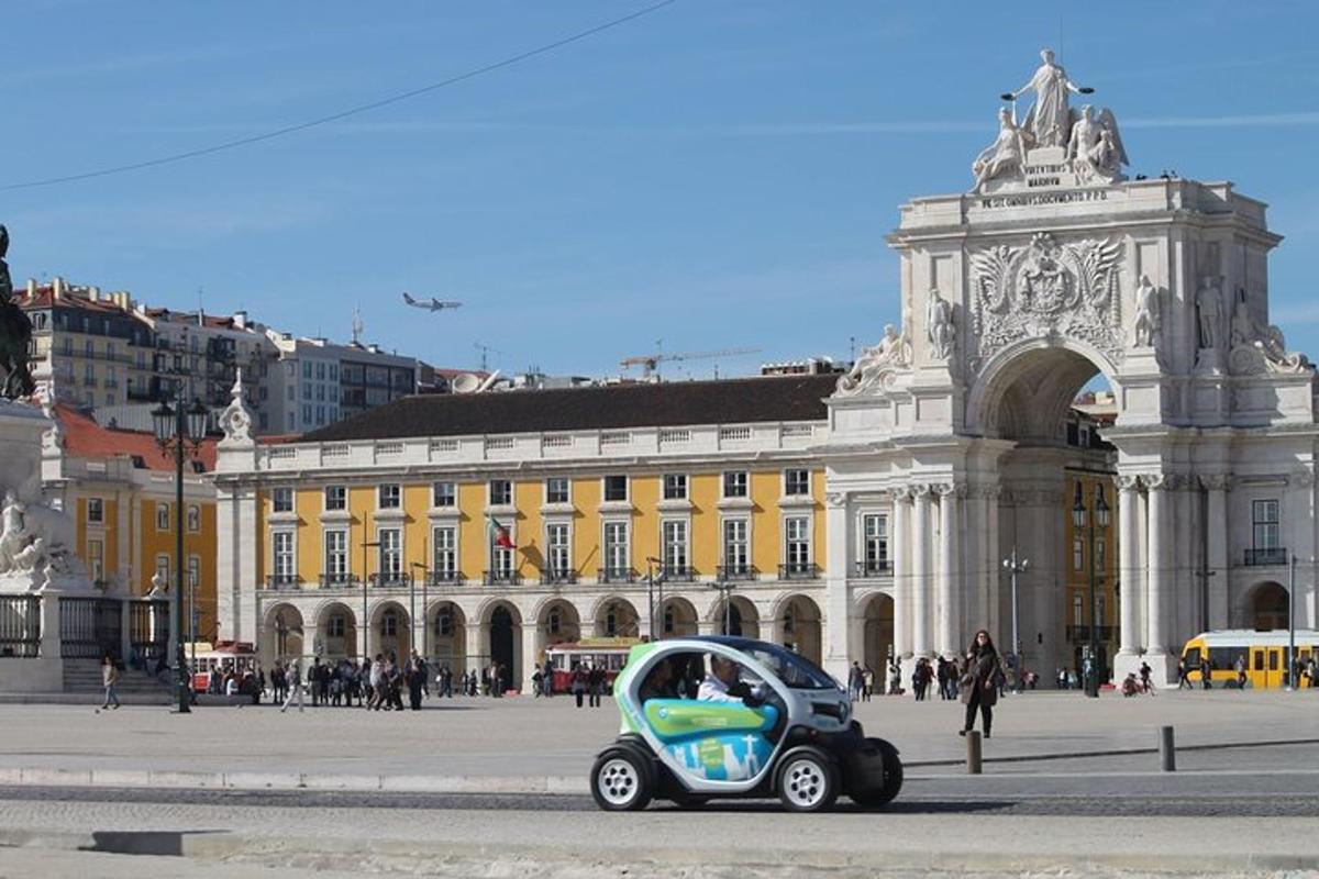 a small car parked in front of a building