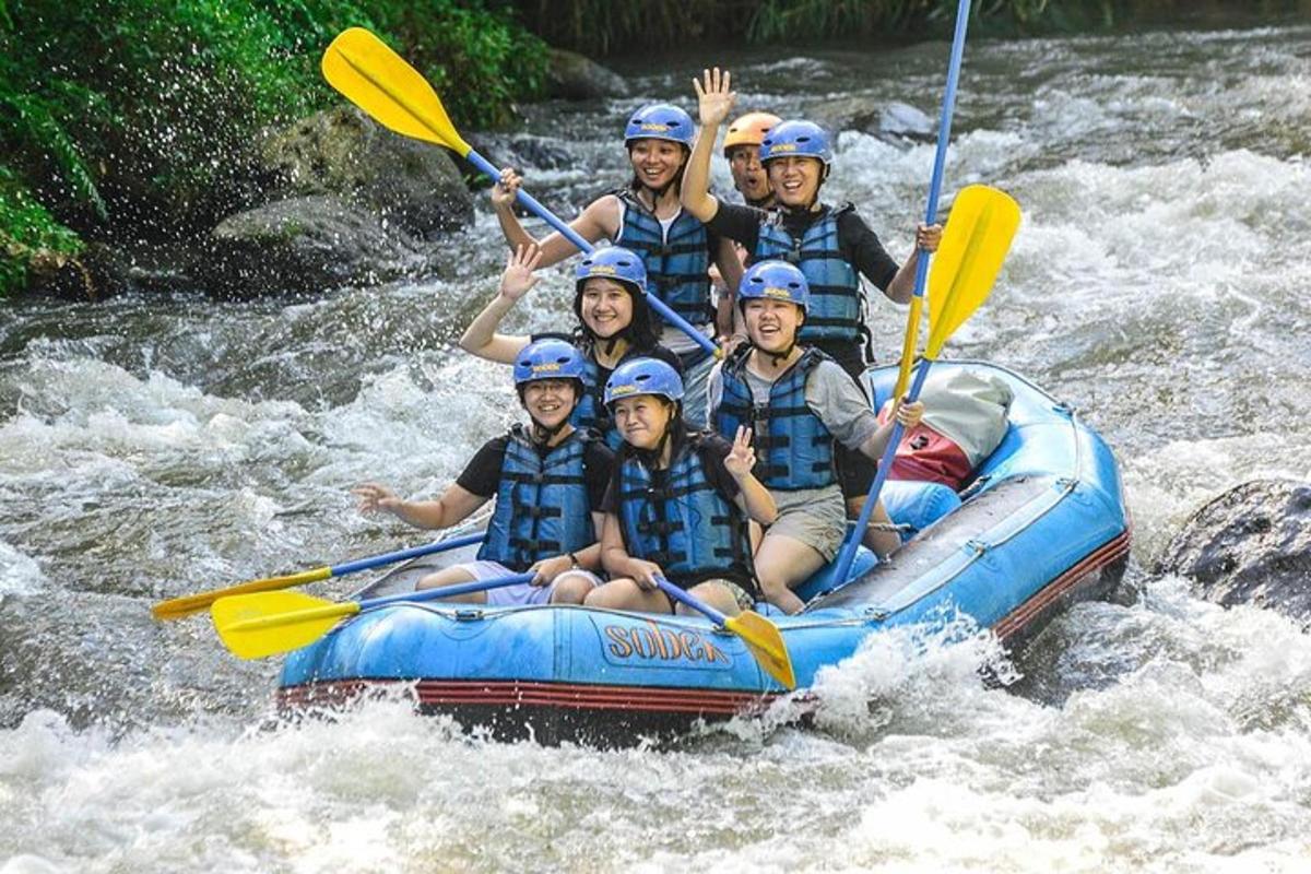 a group of people in a raft on a river