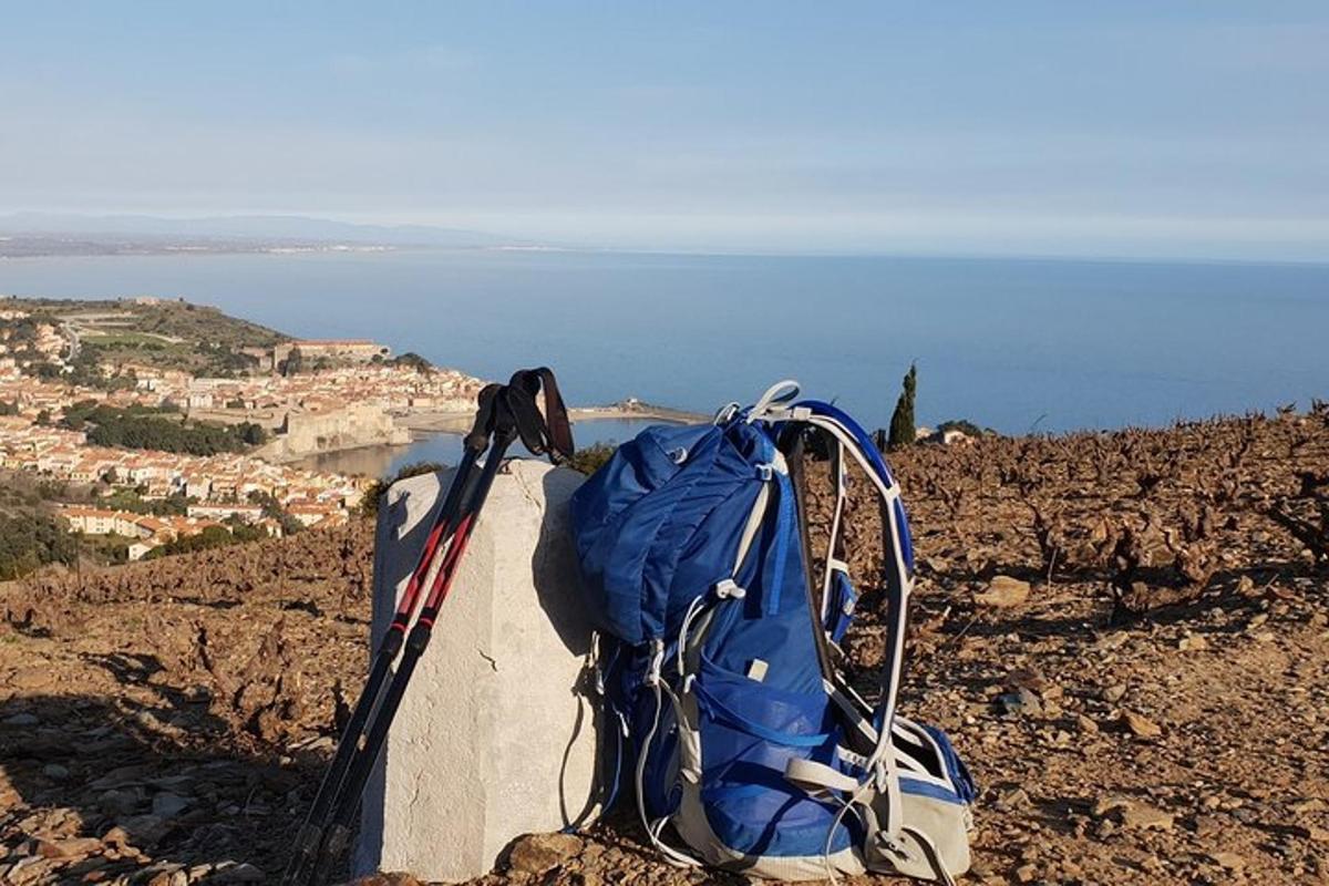 a blue backpack sitting on top of a mountain