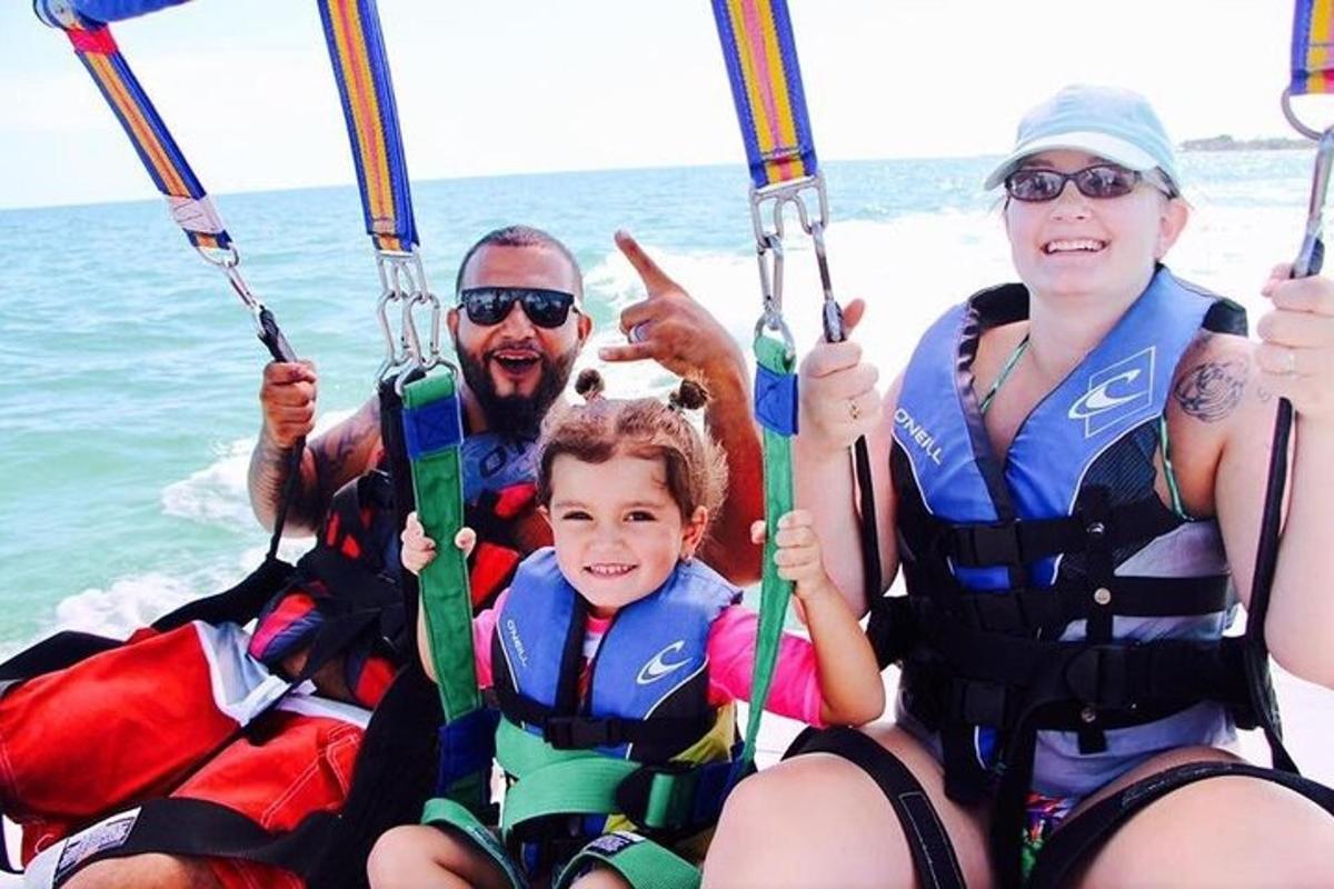 a group of people on a boat in the water