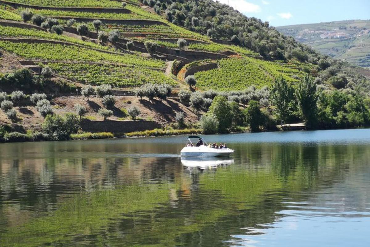 a group of people in a boat on a lake