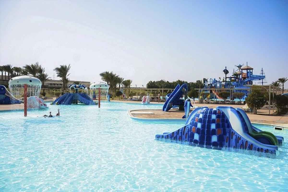 a water park with a water slide and slides