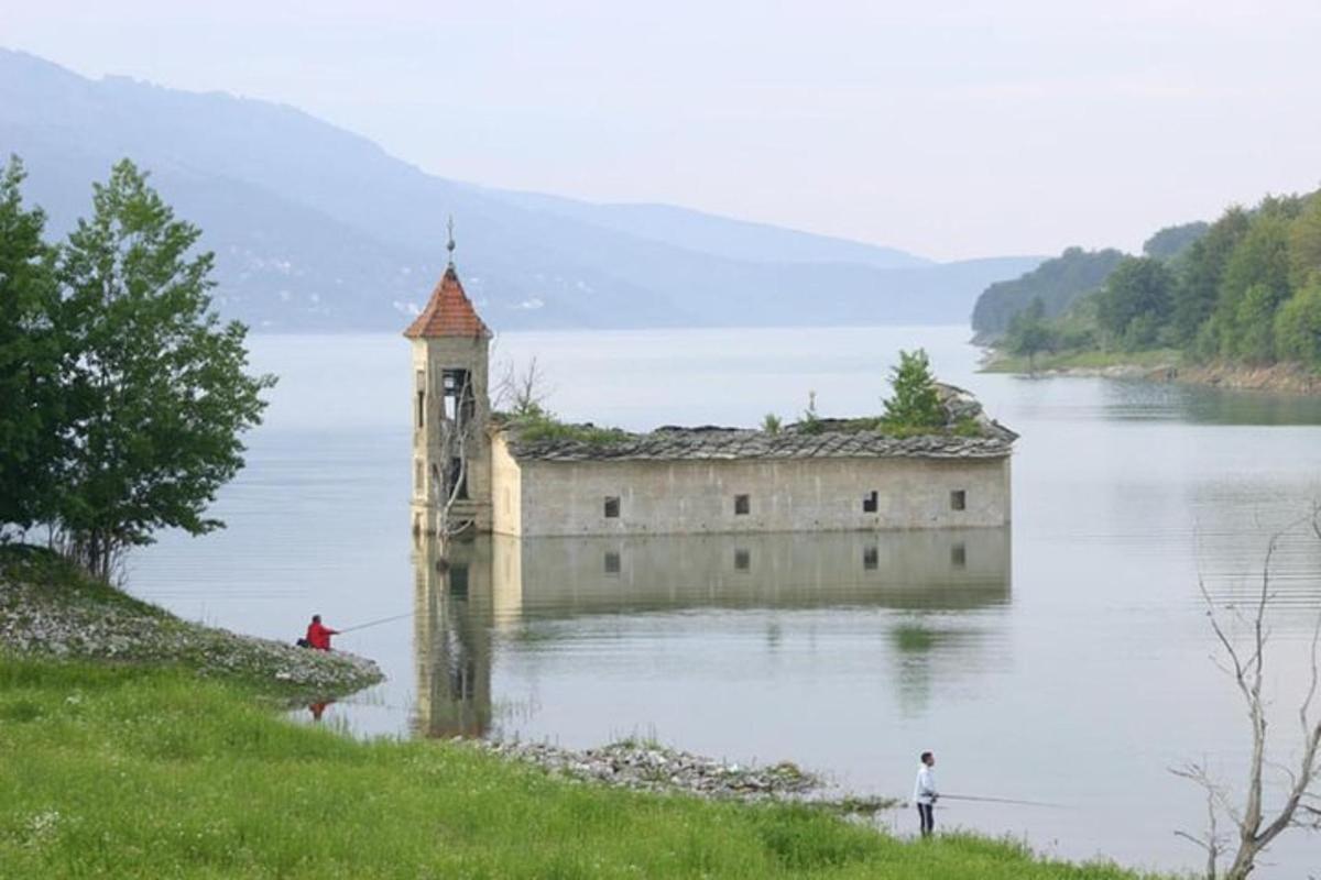 a castle in the middle of a body of water