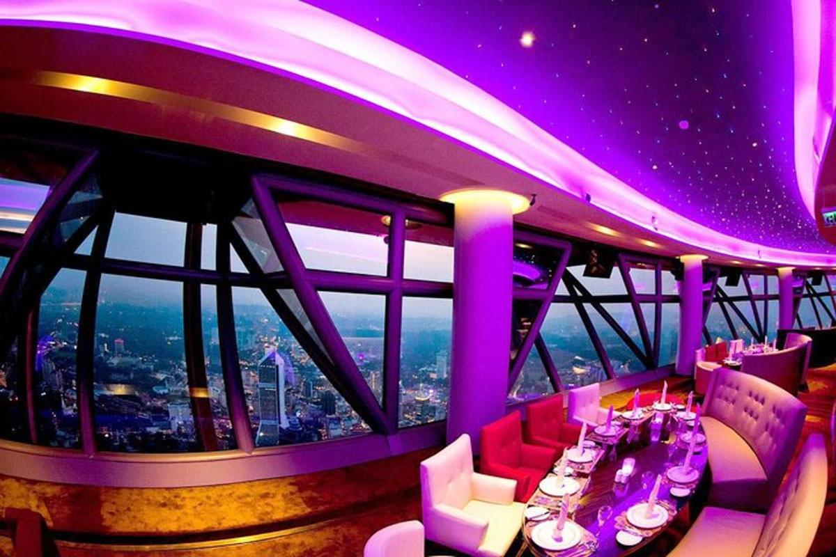 a restaurant with a view of a city