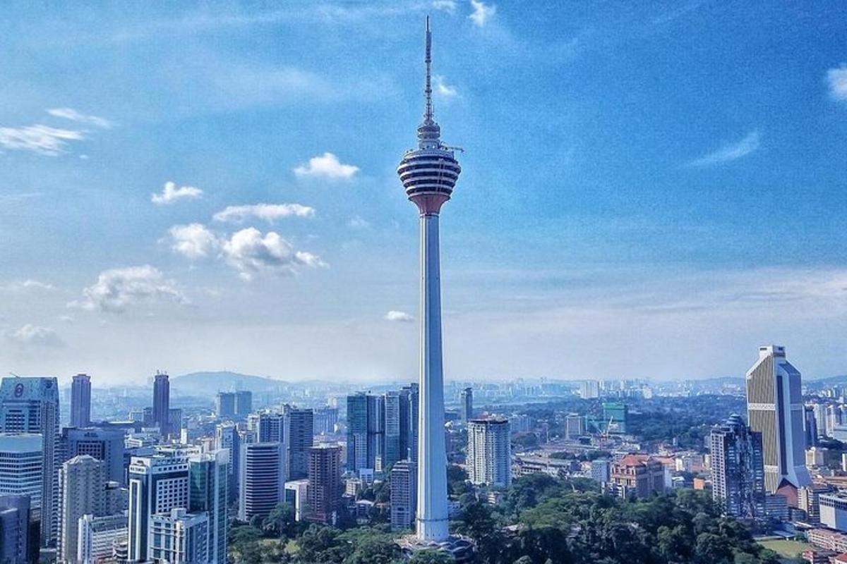 a view of a city with a tall tower