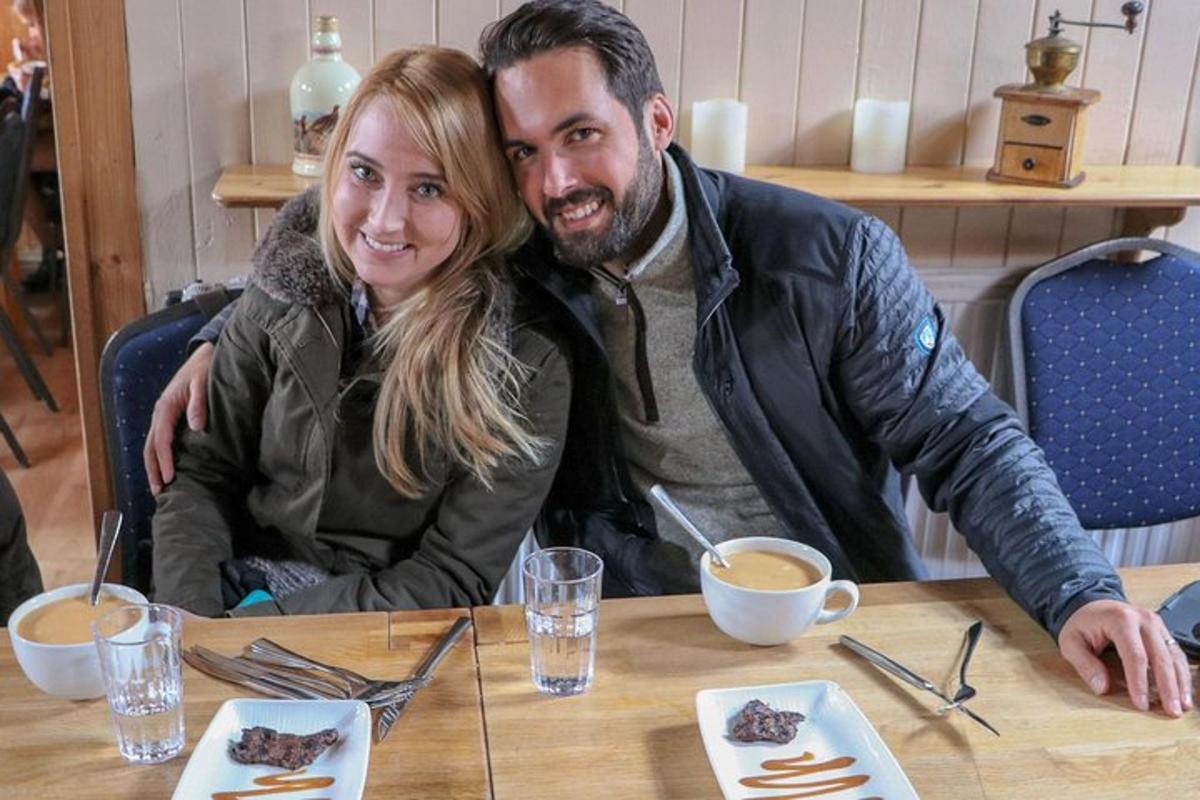 a man and a woman sitting at a table