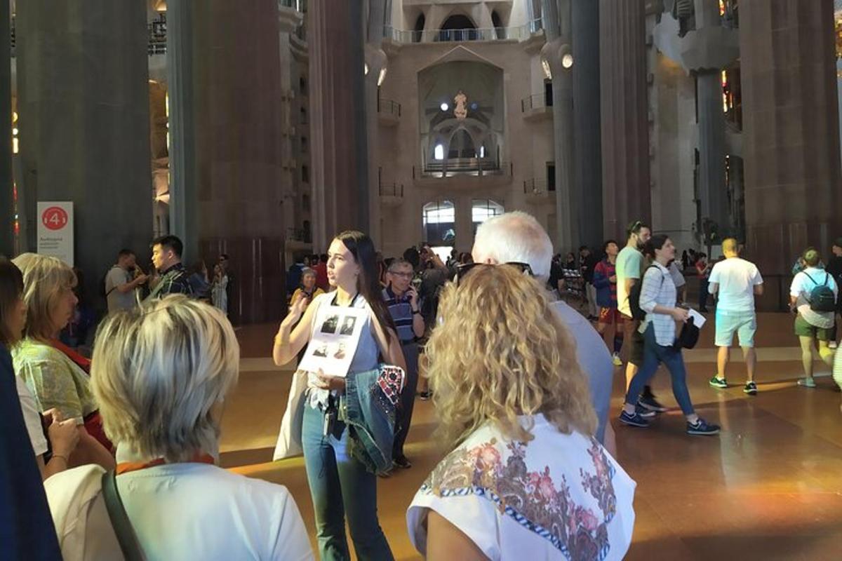 a group of people standing in a large room