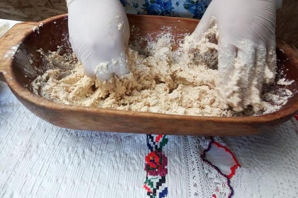 a person is mixing ingredients in a bowl