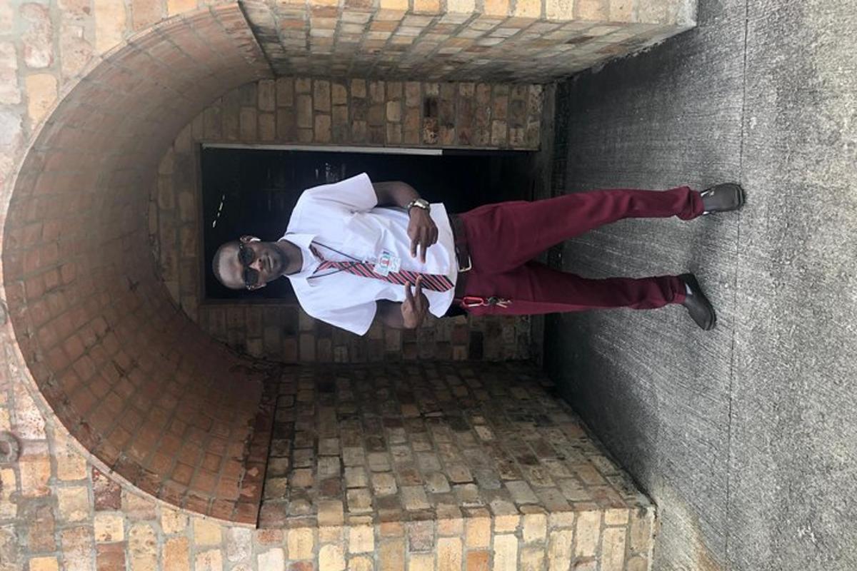 a man talking on a cell phone in a tunnel