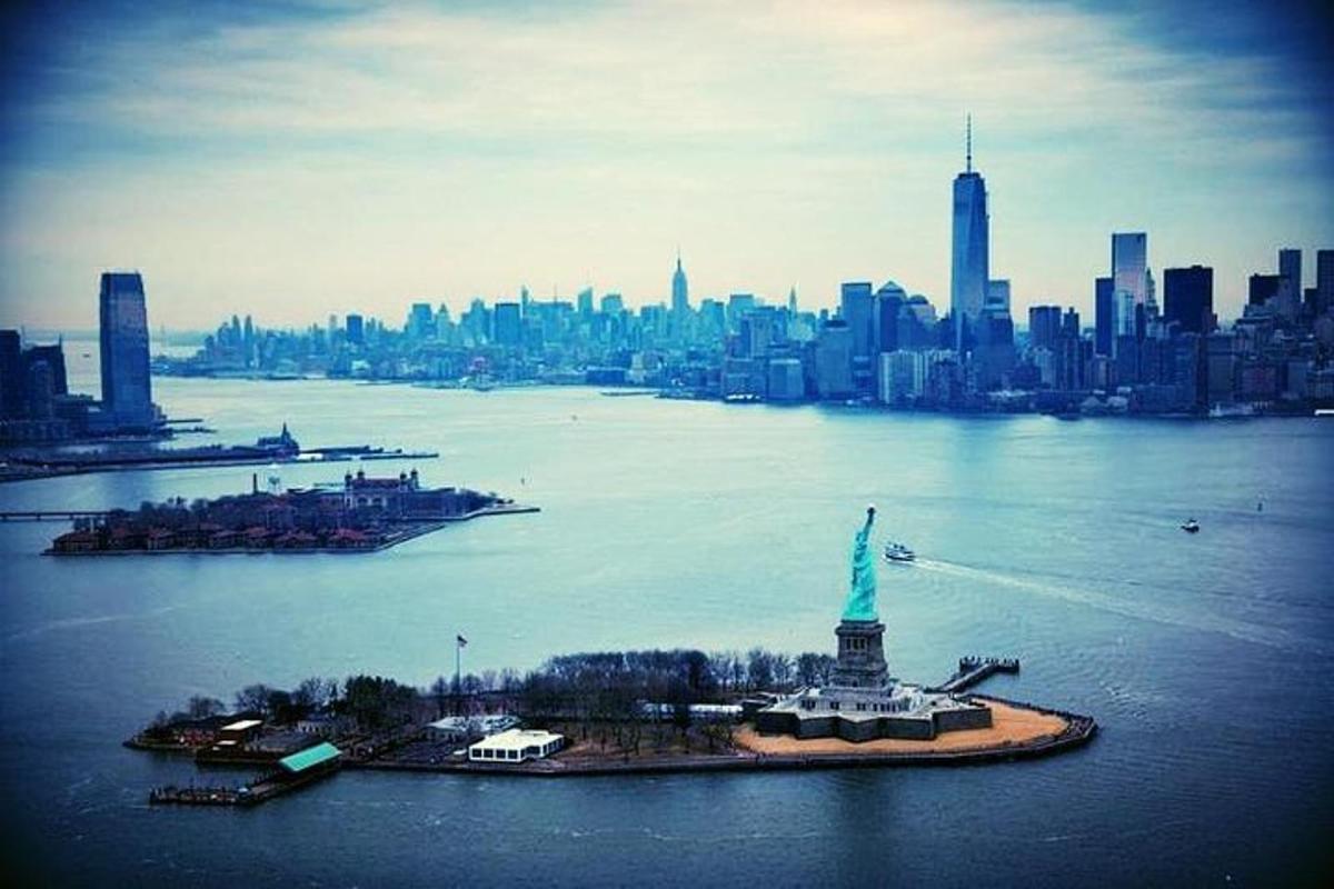 a view of the statue of liberty and a city
