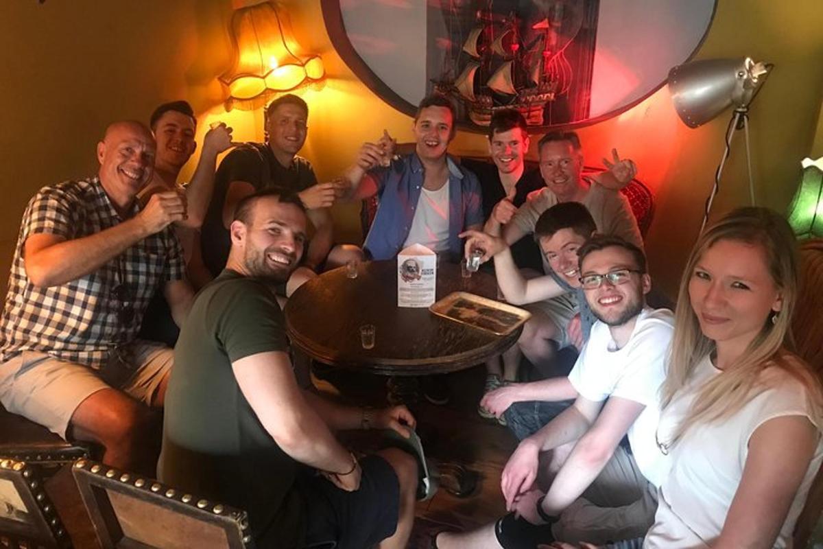 a group of people sitting around a table in a room