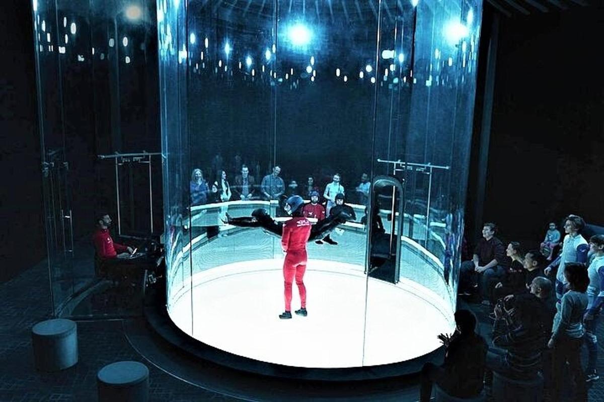a person is on a stage in a room