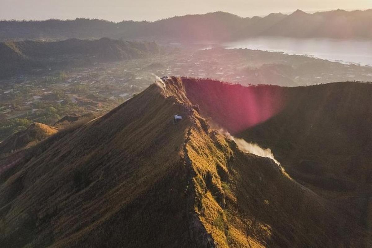 a mountain with a rainbow on the top of it