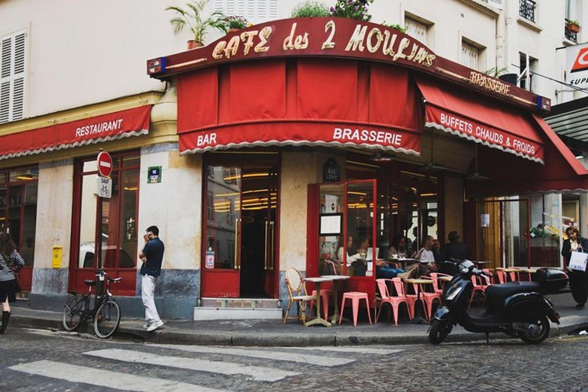 un home dret davant d'un restaurant al carrer