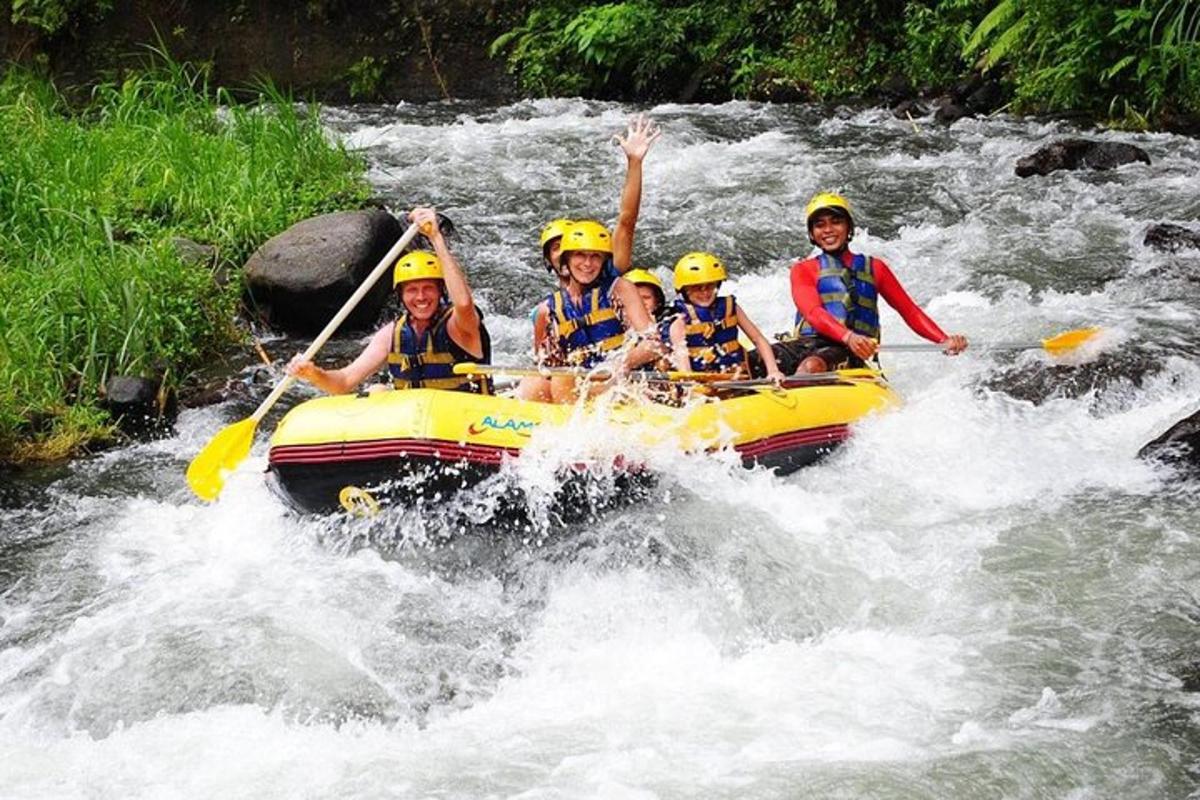 a group of people in a raft in a river