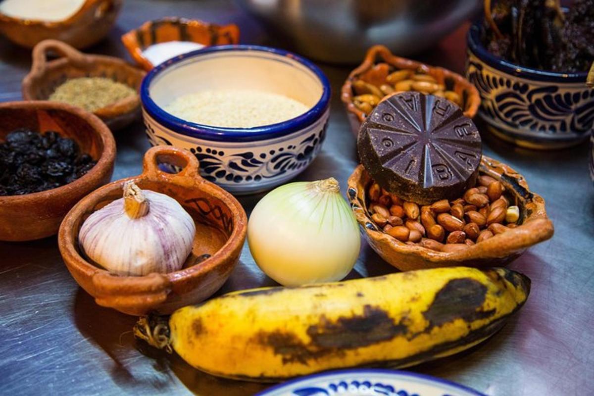 a table with bowls of ingredients and a banana and nuts