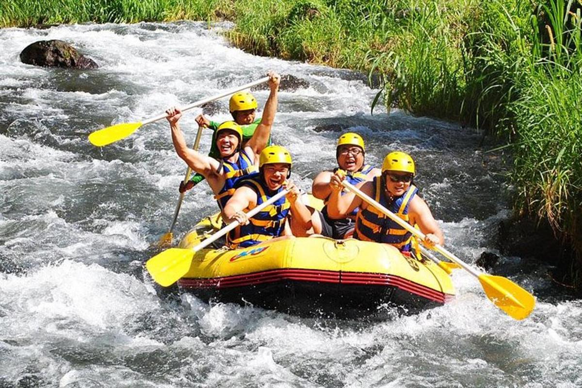 a group of people in a raft on a river
