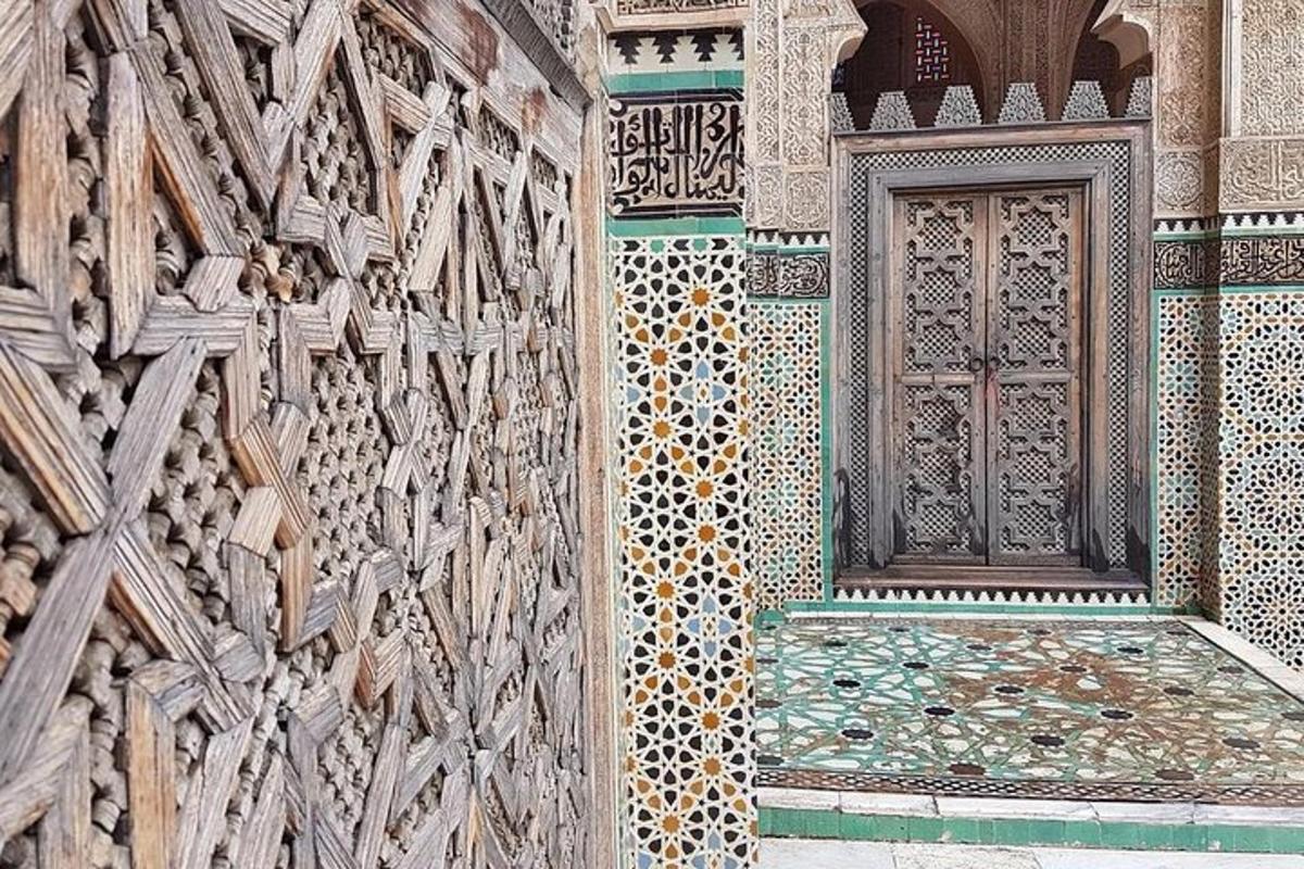 a building with a door and a tile wall