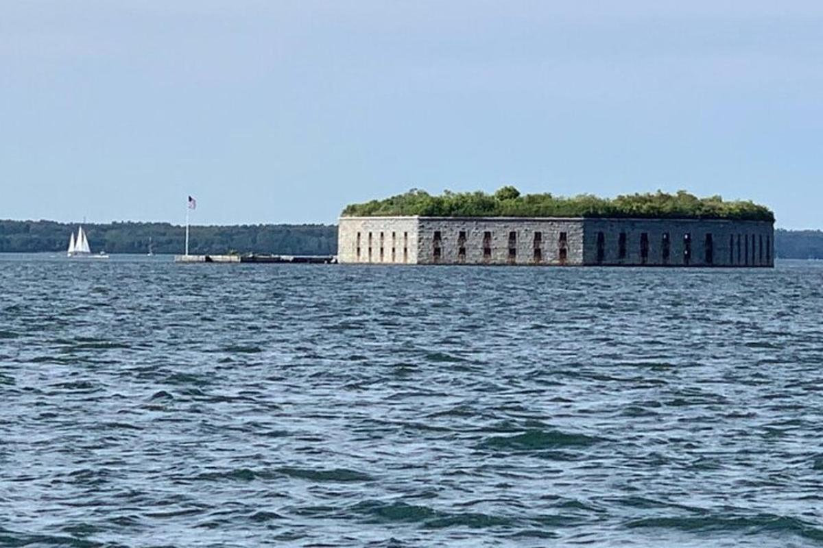 a large building in the middle of a large body of water