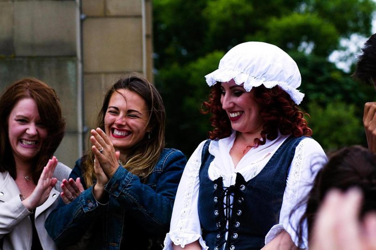 a group of women are laughing and clapping