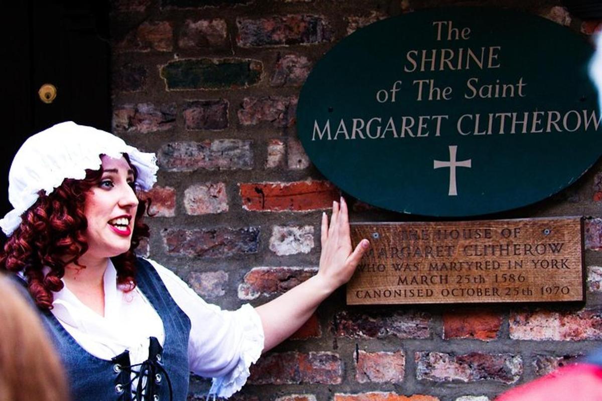 a woman is standing in front of a sign