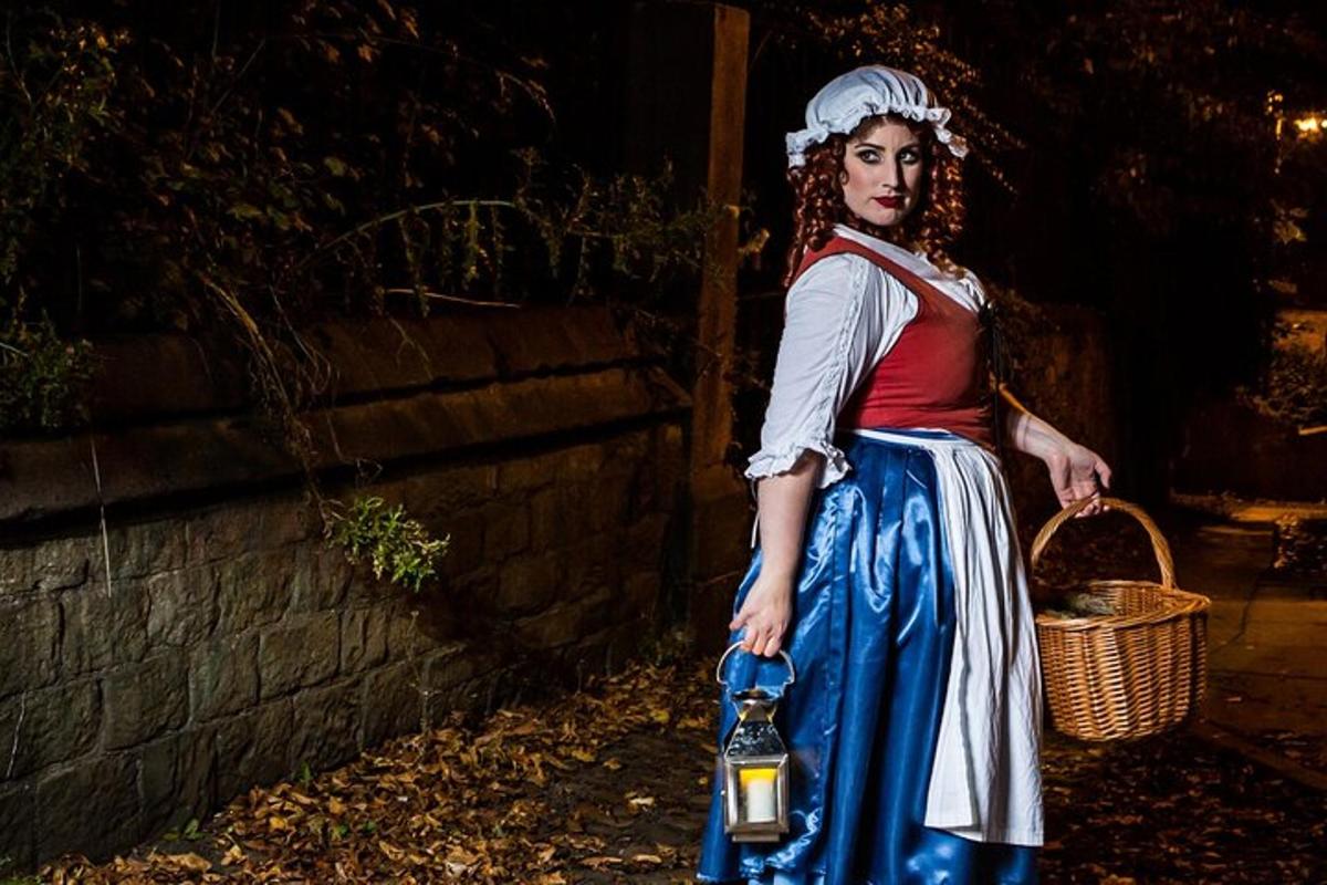 a woman in a costume holding a bottle and a basket