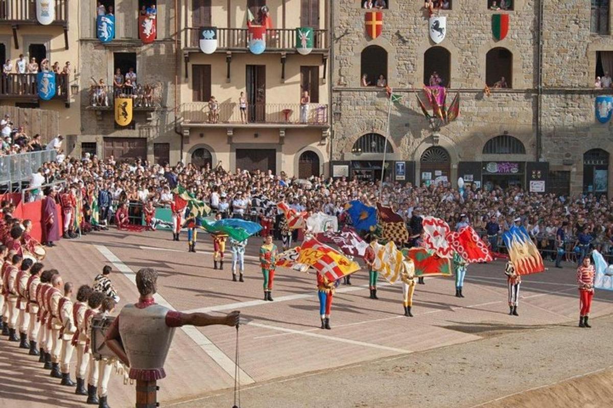 a large crowd of people watching a parade