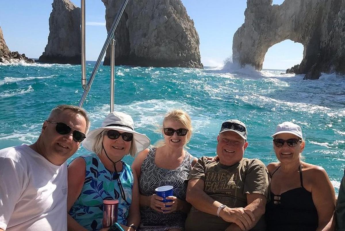 a group of people on a boat in the ocean