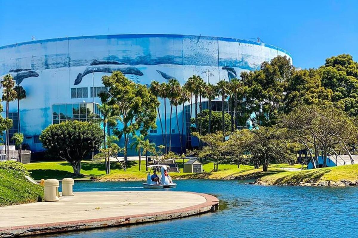 a view of a building with a river in front