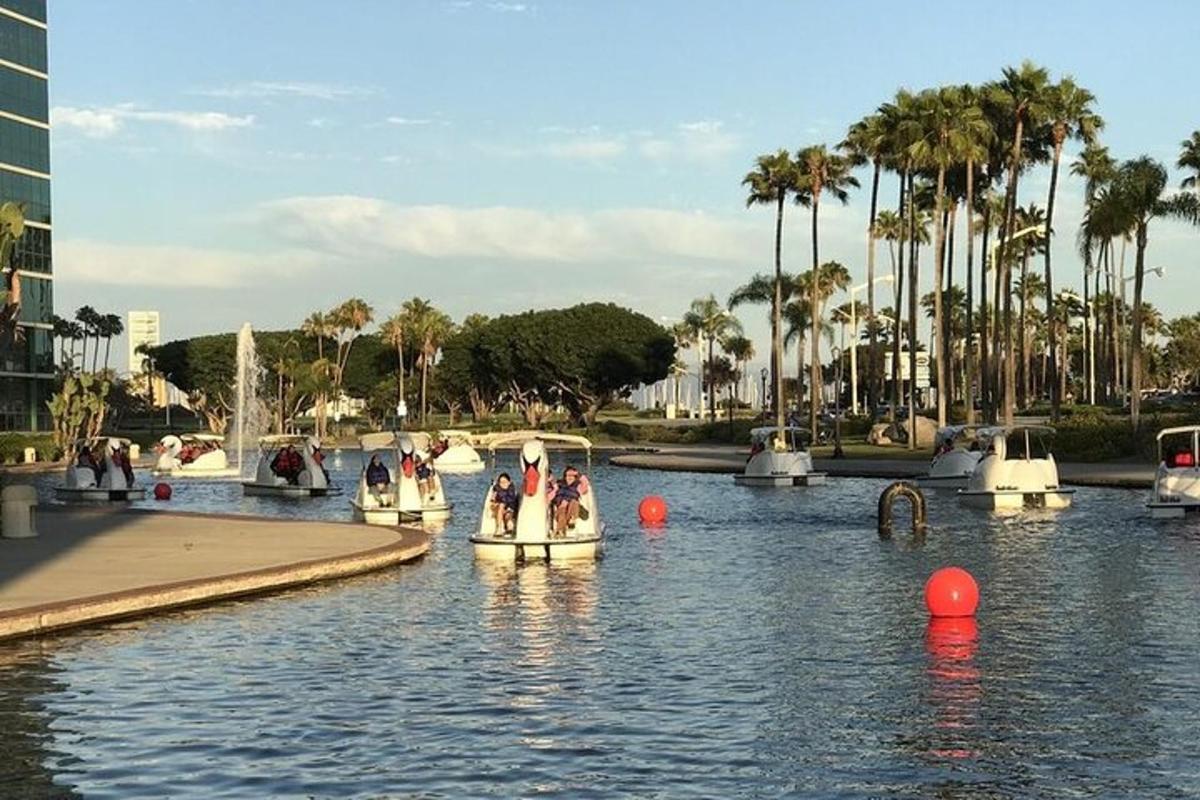 people are riding on boats in a body of water