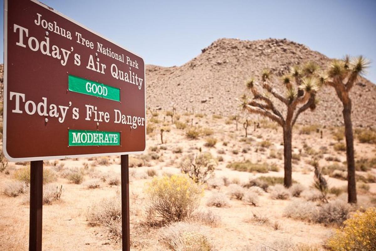 a sign in the middle of the desert