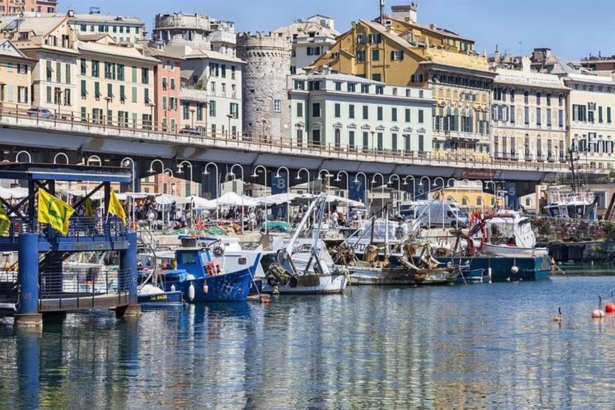 a group of boats docked in a harbor with buildings
