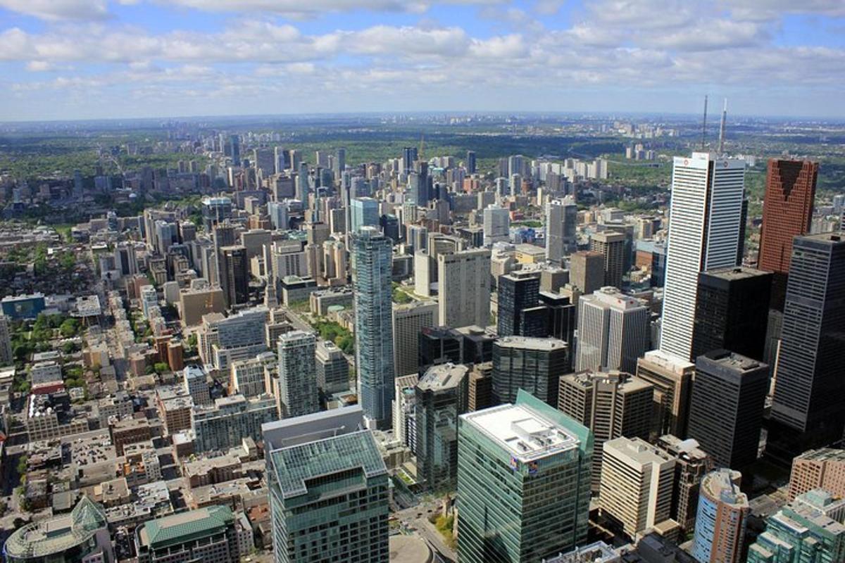 an aerial view of a large city with tall buildings